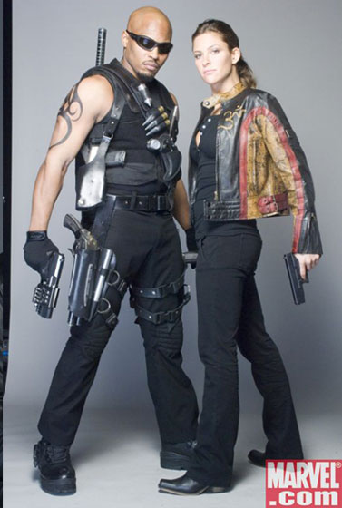 Posing with their weapons