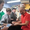 Axel Alonso signing autographs at Midtown Comics' Meet the Publishers