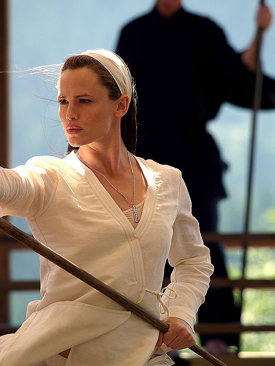 Dressed in white, Elektra practices