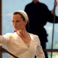Dressed in white, Elektra practices