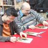 Jae and Peter sign for the fans