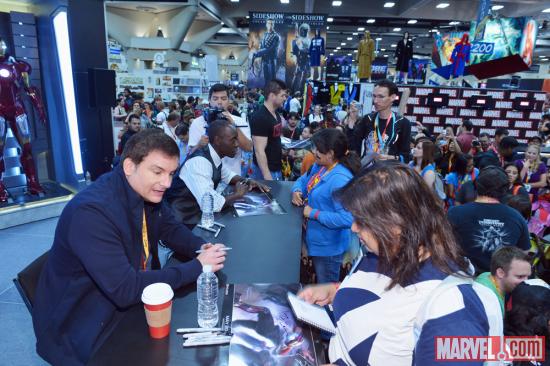 Iron Man 3 director Shane Black and star Don Cheadle signing at the Marvel Booth at SDCC 2012