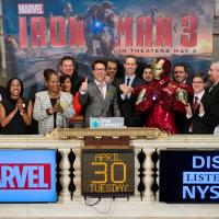 Robert Downey Jr. ringing the opening bell at the NYSE, along with Iron Man and the Marvel staff