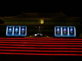 Robert Downey Jr poses amongst the Hall of Armors in China during the "Iron Man 3" World Tour