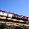 Iron Man on the side of Marvel's Iron Man 3-wrapped monorail at the Walt Disney World Resort