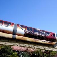 Iron Man on the side of Marvel's Iron Man 3-wrapped monorail at the Walt Disney World Resort