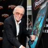 Stan Lee signing the special Avengers poster