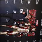 Robert Downey Jr stands with the Mark 42 armor at the chinese premier of Marvel's Iron Man 3