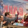 Robert Downey Jr. ringing the opening bell at the NYSE, along with Iron Man and the Marvel staff