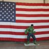 Hulk in front of a giant American Flag