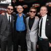 Chris Evans and Jeremy Renner with Army Specialist Jason Braase (Ret.) and Marine Corporal Adam Harris (Ret.)