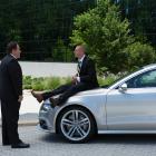 Happy Hogan (Jon Favreau) questions Savin (James Badge Dale) on the Audi S7 Sportback in Marvel's Iron Man 3