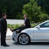 Happy Hogan (Jon Favreau) questions Savin (James Badge Dale) on the Audi S7 Sportback in Marvel's Iron Man 3