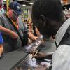 SDCC 2012: Don Cheadle signs at the Marvel Booth