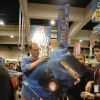 Fans in line for "Iron Man 2 The Video Game" posters