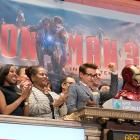 Robert Downey Jr. ringing the opening bell at the NYSE, along with Iron Man and the Marvel staff