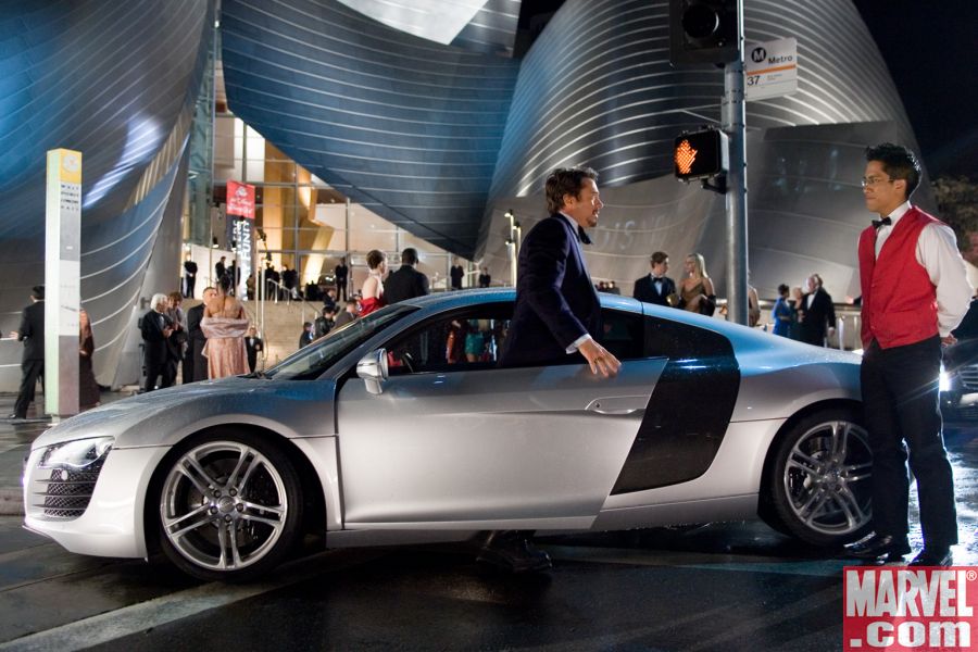 Robert Downey Jr. emerges from Tony Stark's Audi R8