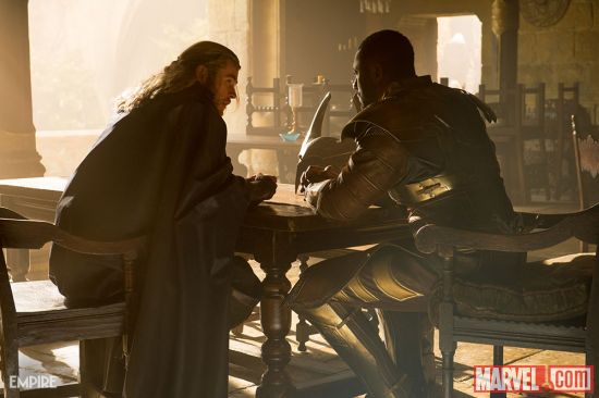 Thor (Chris Hemsworth) confers with Heimdall (Idris Elba) in Marvel's Thor: The Dark World