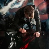 Chris Hemsworth signs a Thor poster