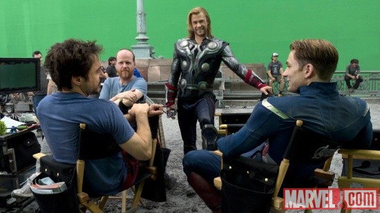 Robert Downey, Jr., director Joss Whedon, Chris Hemsworth and Chris Evans behind the scenes of Marvel's The Avengers