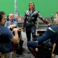 Robert Downey, Jr., director Joss Whedon, Chris Hemsworth and Chris Evans behind the scenes of Marvel's The Avengers