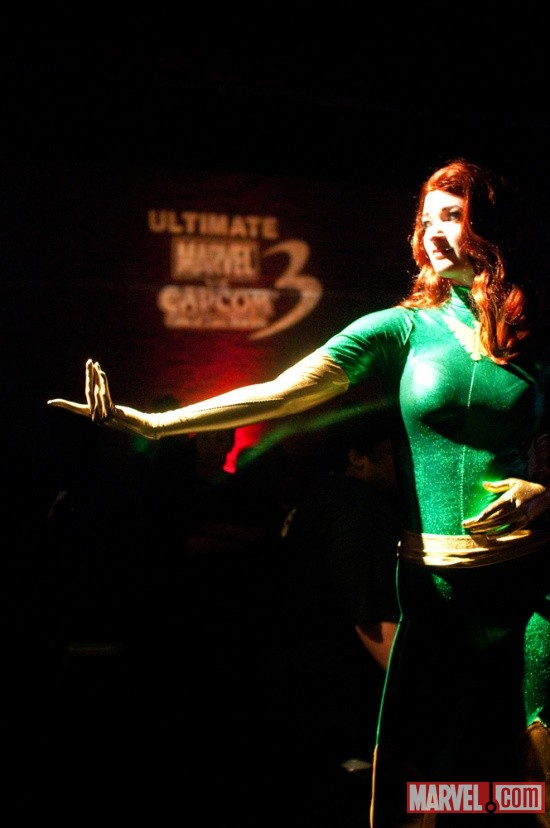 Phoenix Cosplayer with the Ultimate Marvel vs. Capcom 3 logo