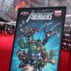 The signed Avengers poster on the L.A. premiere red carpet