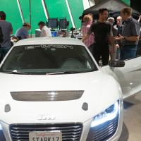 Robert Downey, Jr. on the set of Marvel's Iron Man 3 with the Audi R8 e-tron