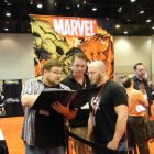 C.B. Cebulski checking out some art at C2E2 2010