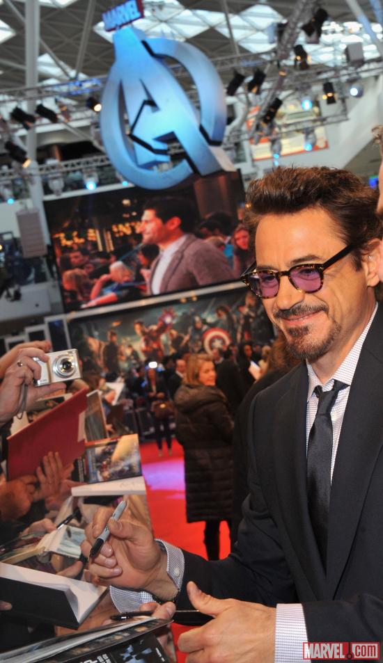 Robert Downey, Jr. signing autographs at the London premiere of "Marvel's The Avengers"