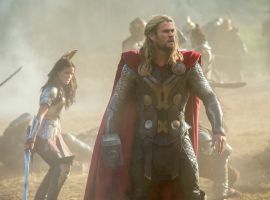 Thor (Chris Hemsworth) and Sif (Jaimie Alexander) on the battlefield in Marvel's Thor: The Dark World