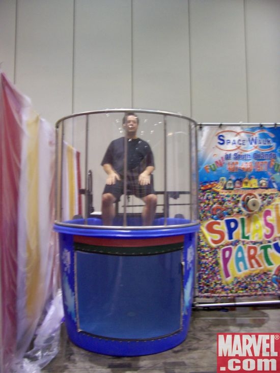 Joe Q in a dunking booth to benefit the Hero Initiative...