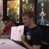Reilly Brown shows off his work