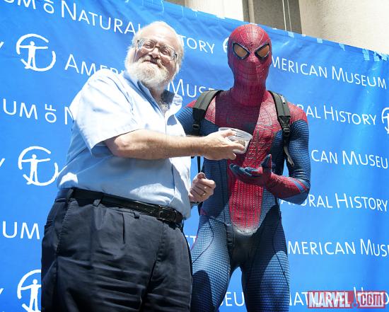 Spider-Man delivering a live Chilean rose tarantula to Norman Plotnick, curator of the exhibition Spiders Alive at the AMNH