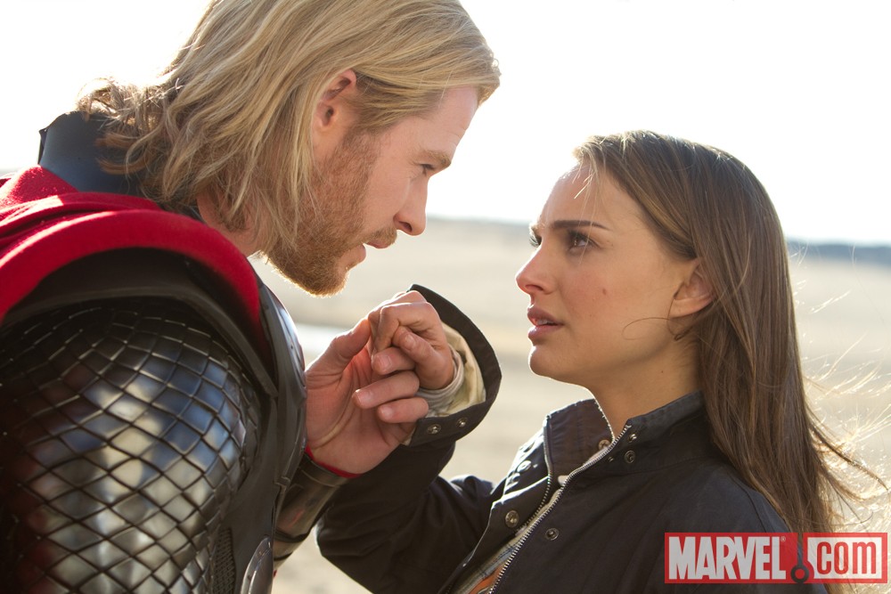 Chris Hemsworth and Natalie Portman share a quiet moment in Thor
