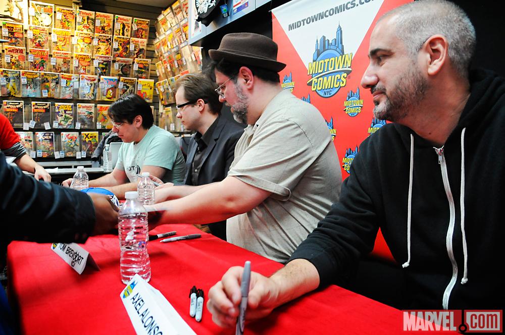 Avengers Vs X-Men Creators at Signing Table at Release Party at Midtown Comics