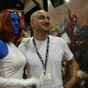 Mystique poses with Marvel Executive Editor Axel Alonso