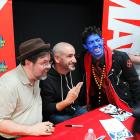 Tom Brevoort, Axel Alonso and Nightcrawler Cosplayer at Avengers Vs X-Men Release Party at Midtown Comics