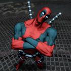 Deadpool strikes a pose in a screenshot from his video game