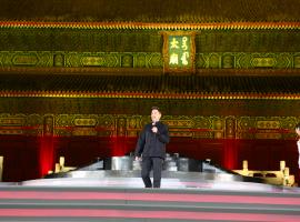 Robert Downey Jr takes the microphone at the Chinese premier of Marvel's Iron Man 3