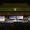 Robert Downey Jr poses and his Chinese costars on stage at the Chinese premier of Marvel's Iron Man 3