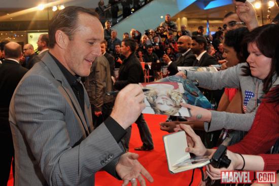 Clark Gregg signing autographs at the London premiere of "Marvel's The Avengers"