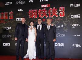 Robert Downey Jr poses with Chinese costar Bingbing Fan on the "Iron Man 3" World Tour