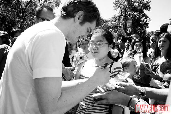 The Amazing Spider-Man Actor Andrew Garfield signing autographs for fans